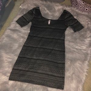 Gray dress with black print on it